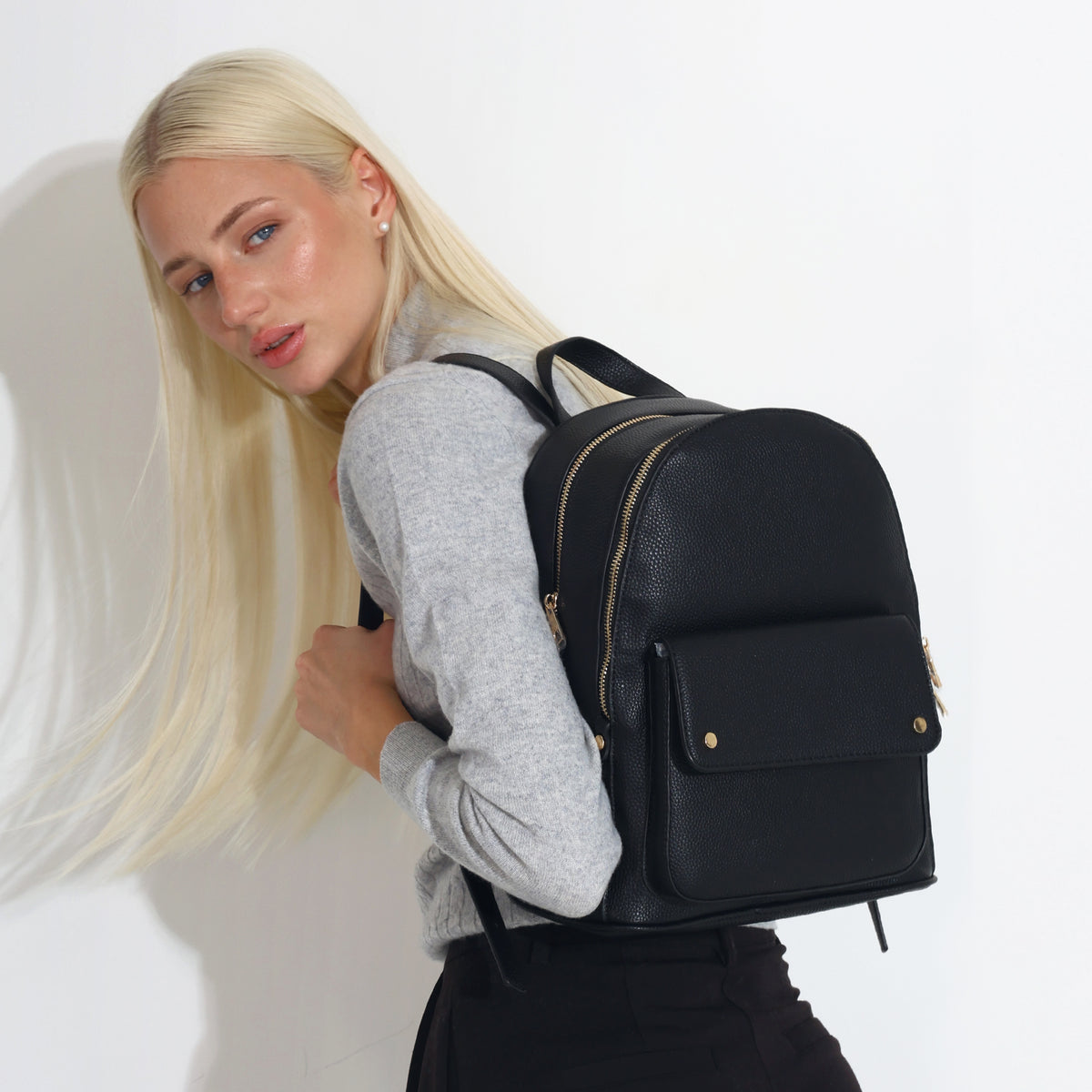 Black backpack outlet with gold zippers